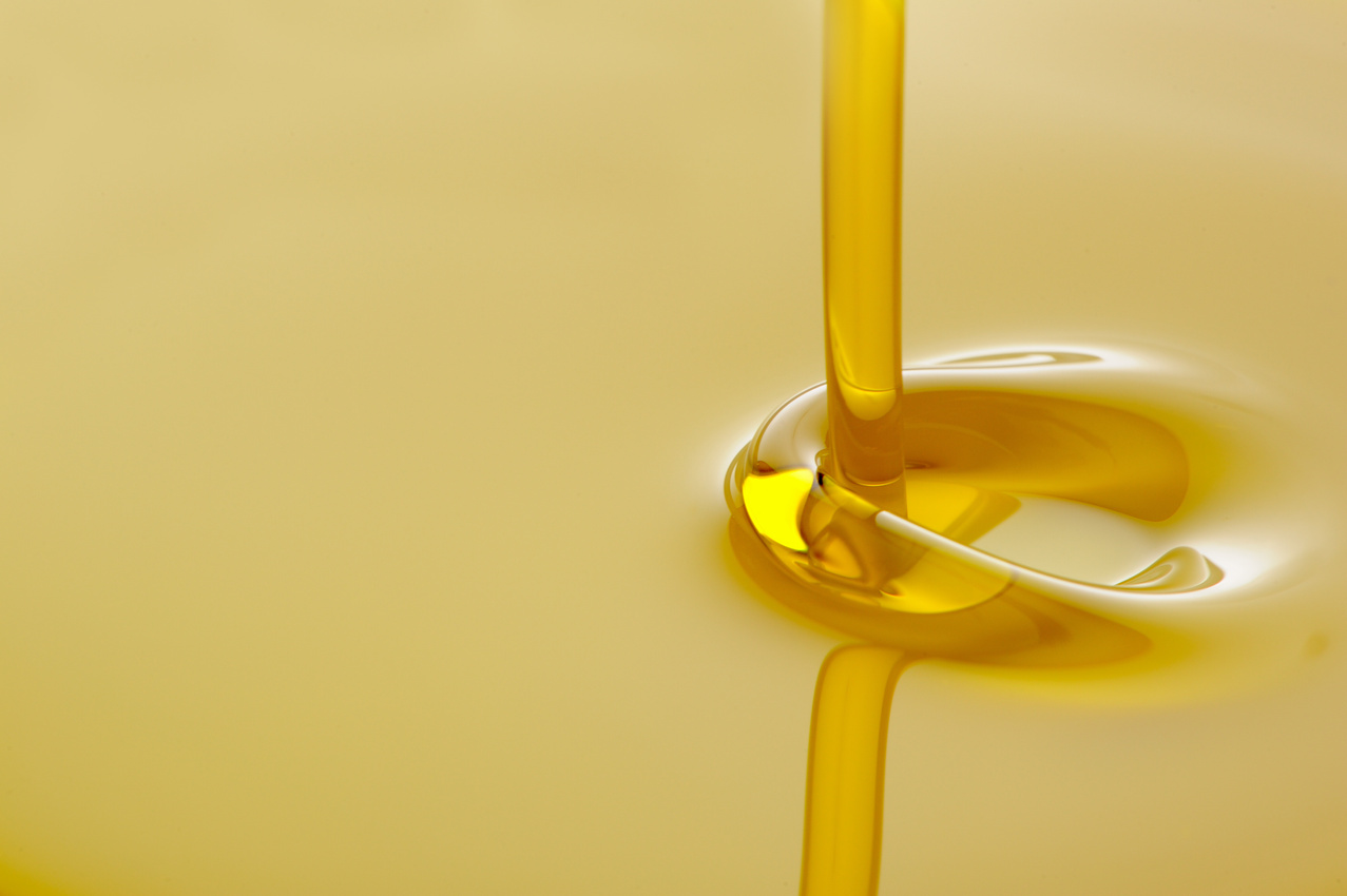 Pouring Olive Oil With Copy Space